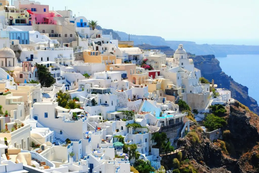 Discover the best sunny destinations for your October travels like Santorini, Greece.