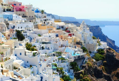 Discover the best sunny destinations for your October travels like Santorini, Greece.