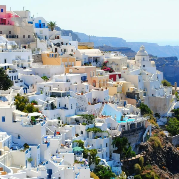 Discover the best sunny destinations for your October travels like Santorini, Greece.